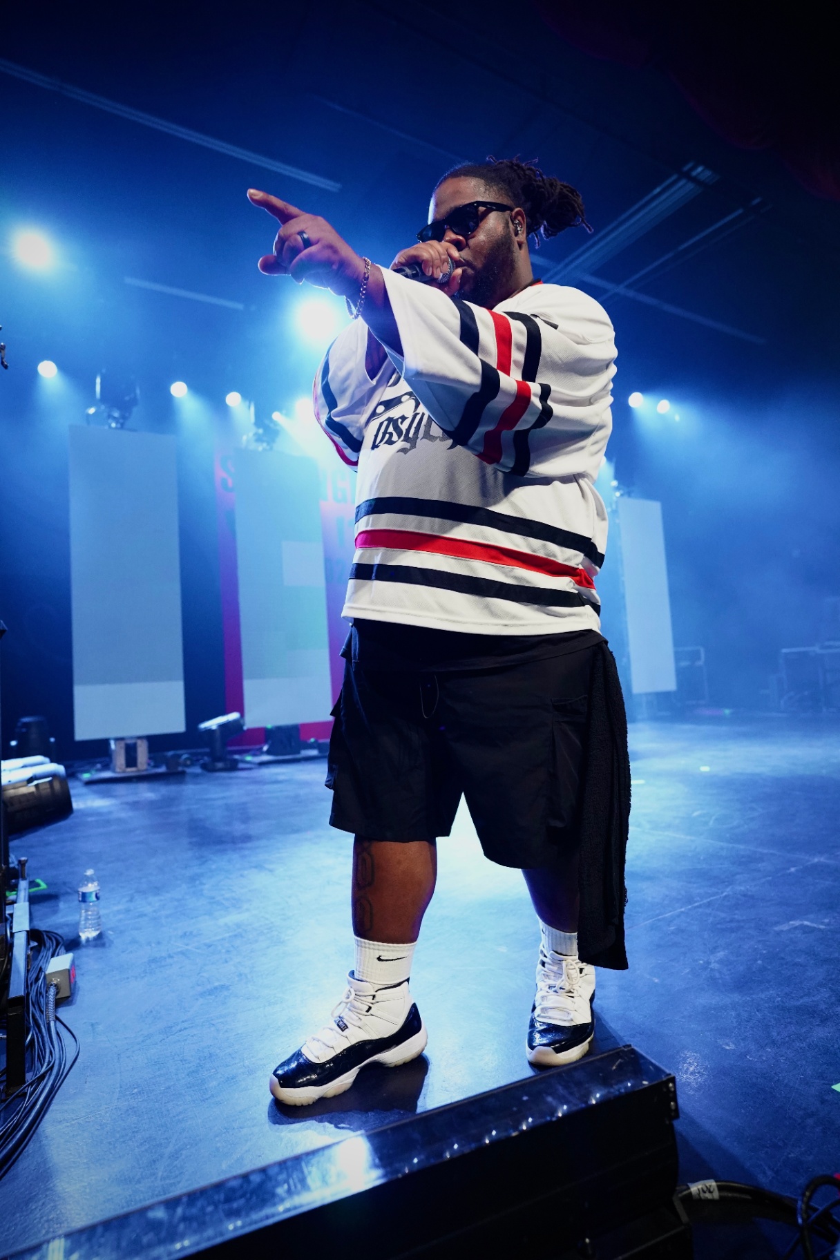 Rapper pointing to the crowd