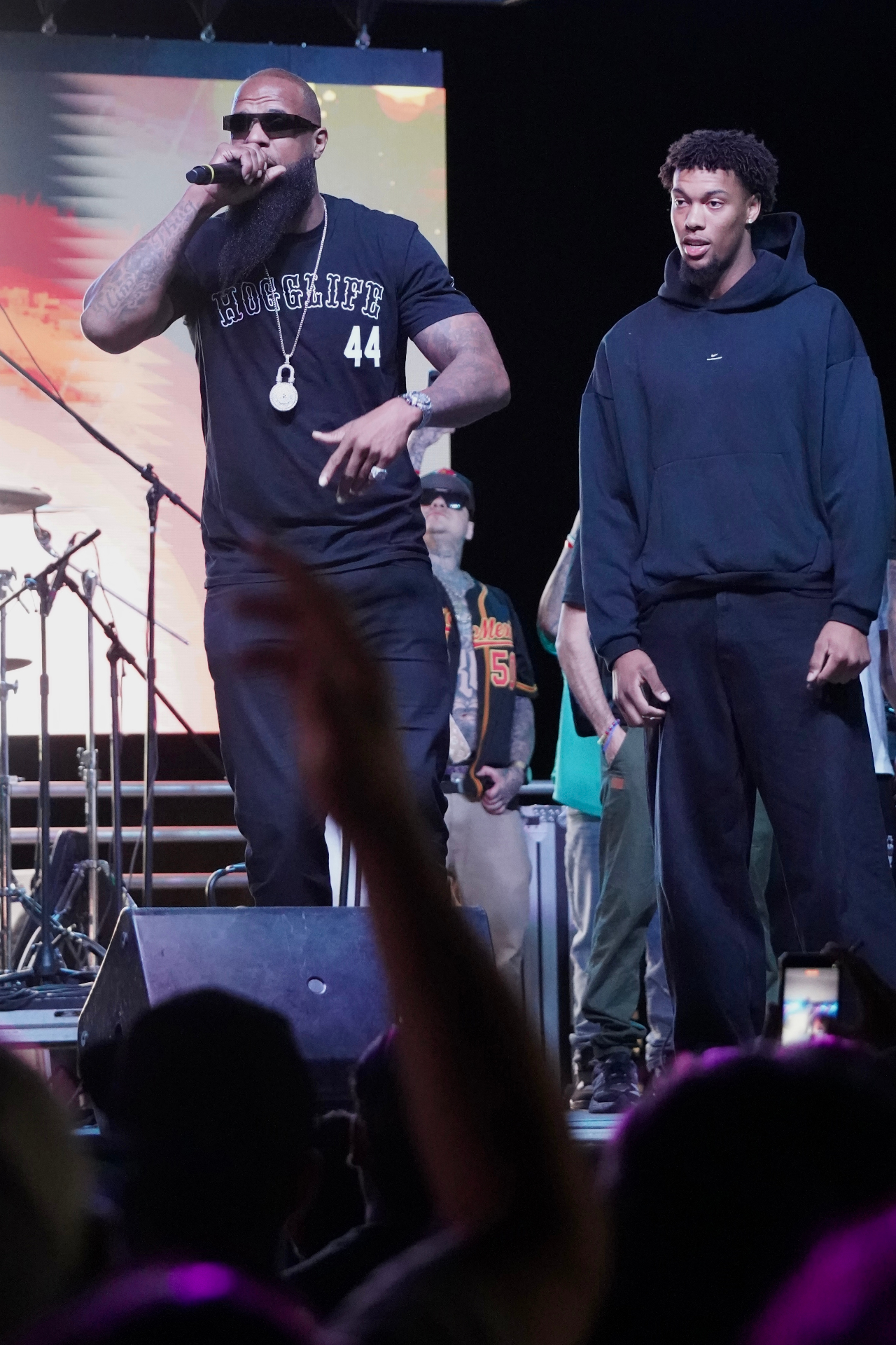 Two artists on stage together